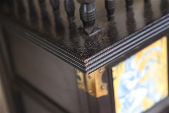 An Aesthetic movement ebonised music cabinet, in the manner of Morris & Co., W.30in.